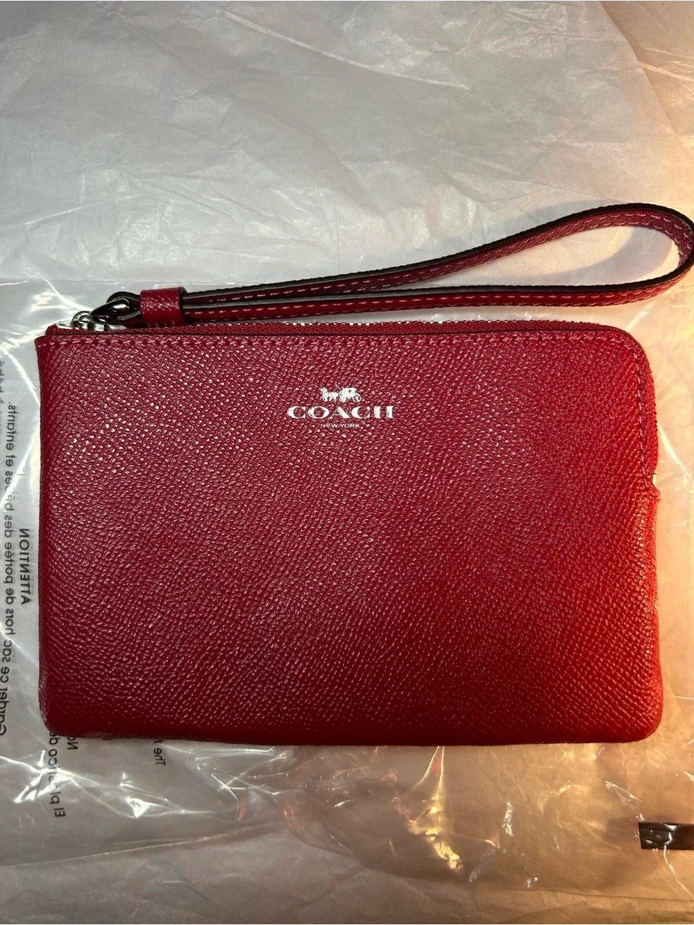 Coach Corner Zip Wristlet in red crossgrain leather with gold-tone hardware like